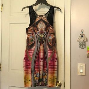 WOW COUTURE body con dress with mesh detailing.